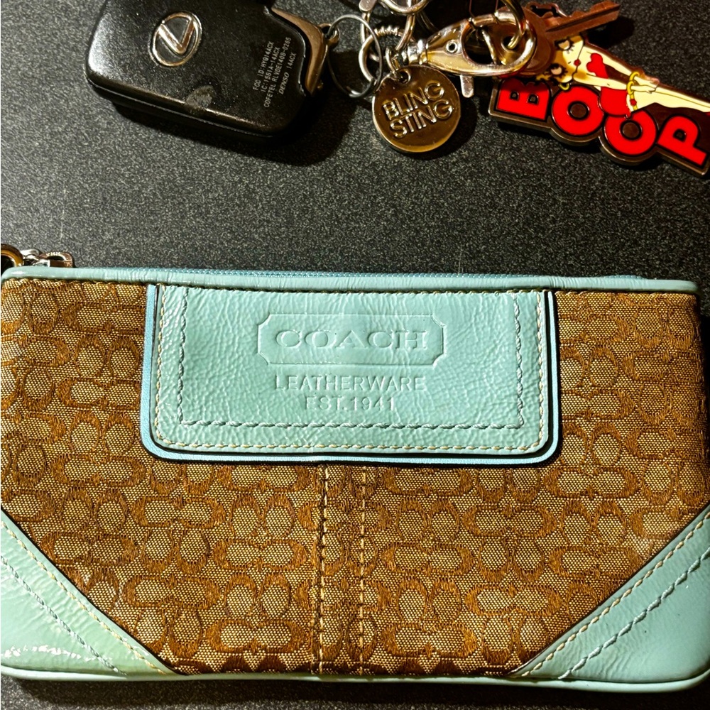 Coach wristlet w/ turquoise accents